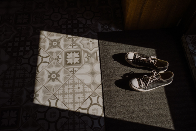 A calm morning and walking shoes in natural window light, suggesting a balanced daily wellness routine. 